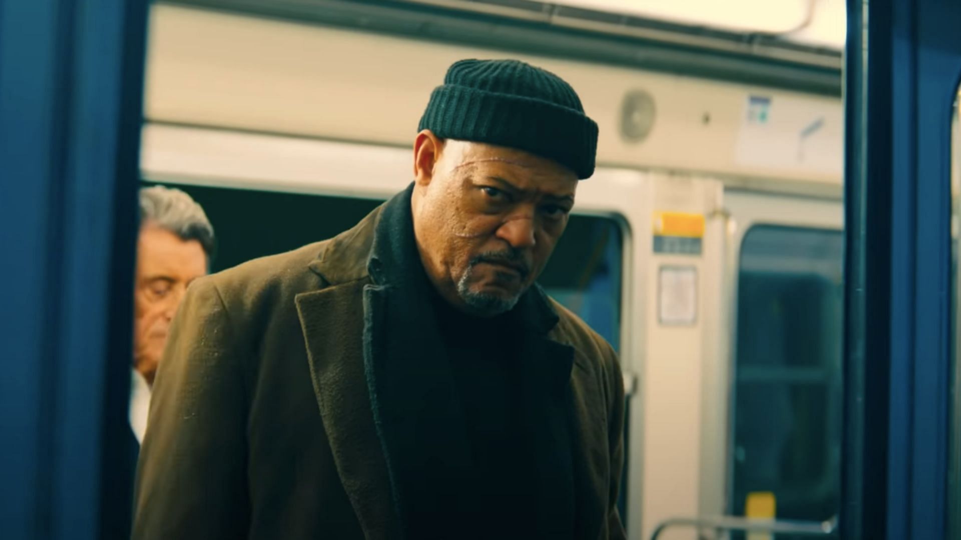Laurence Fishburne plays The Bowery King (Image via Lionsgate)